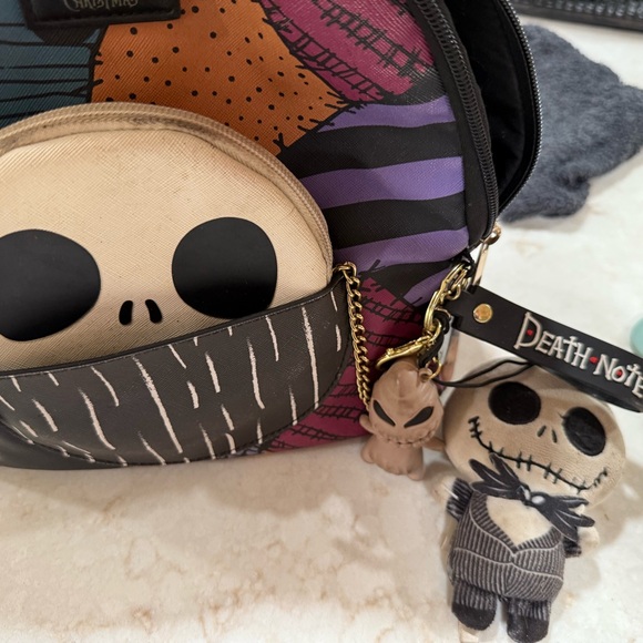 Loungefly Skull and Stripes Backpack with Plush Keychain - Picture 1 of 12